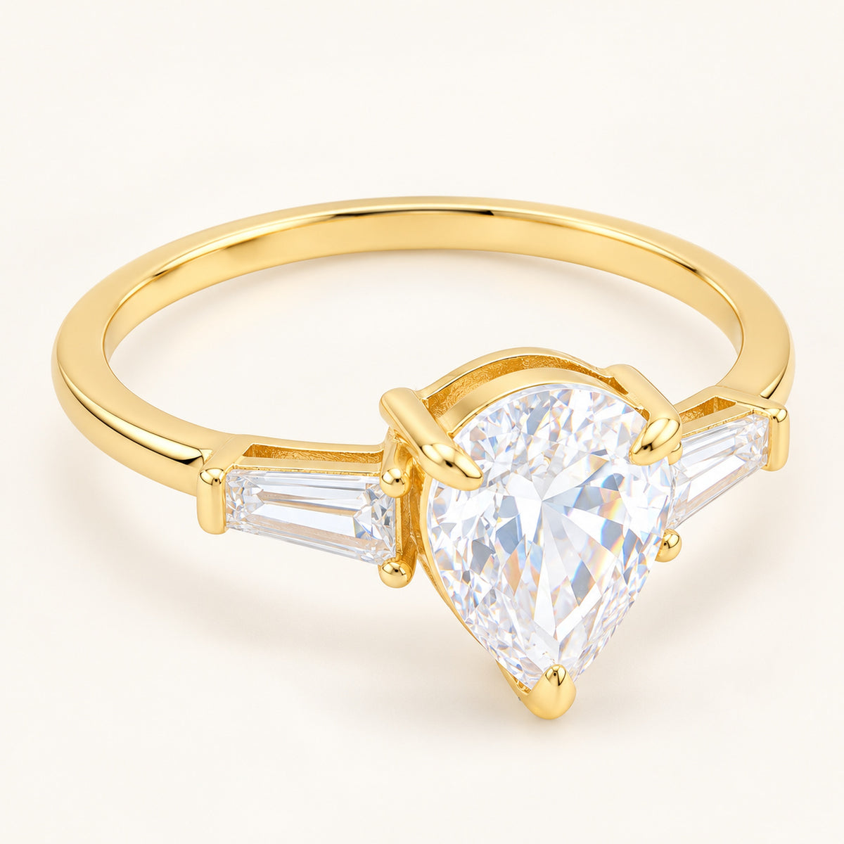 Pear Cut Cubic Zirconia Three Stone Gold Plated Silver Engagement Ring